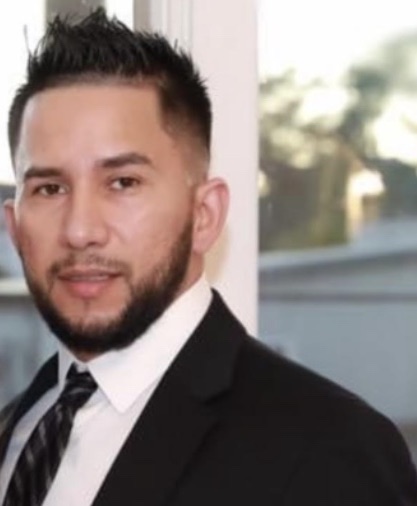 a man wearing a suit and tie