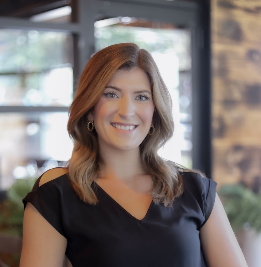 a woman smiling at camera