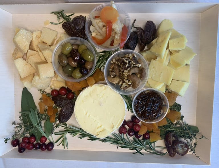 a dish is filled with different types of food on a table