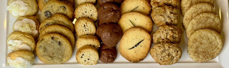 cookies for takeout including lemon, chocolate chip, sesame, double chocolate, rosemary, snickerdoodle