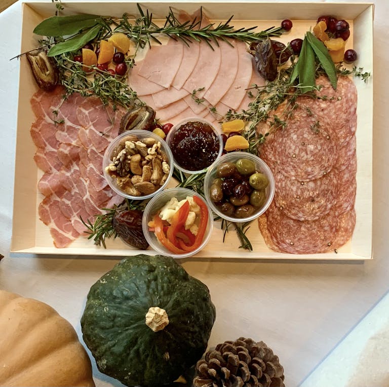 a box filled with different types of food on a table