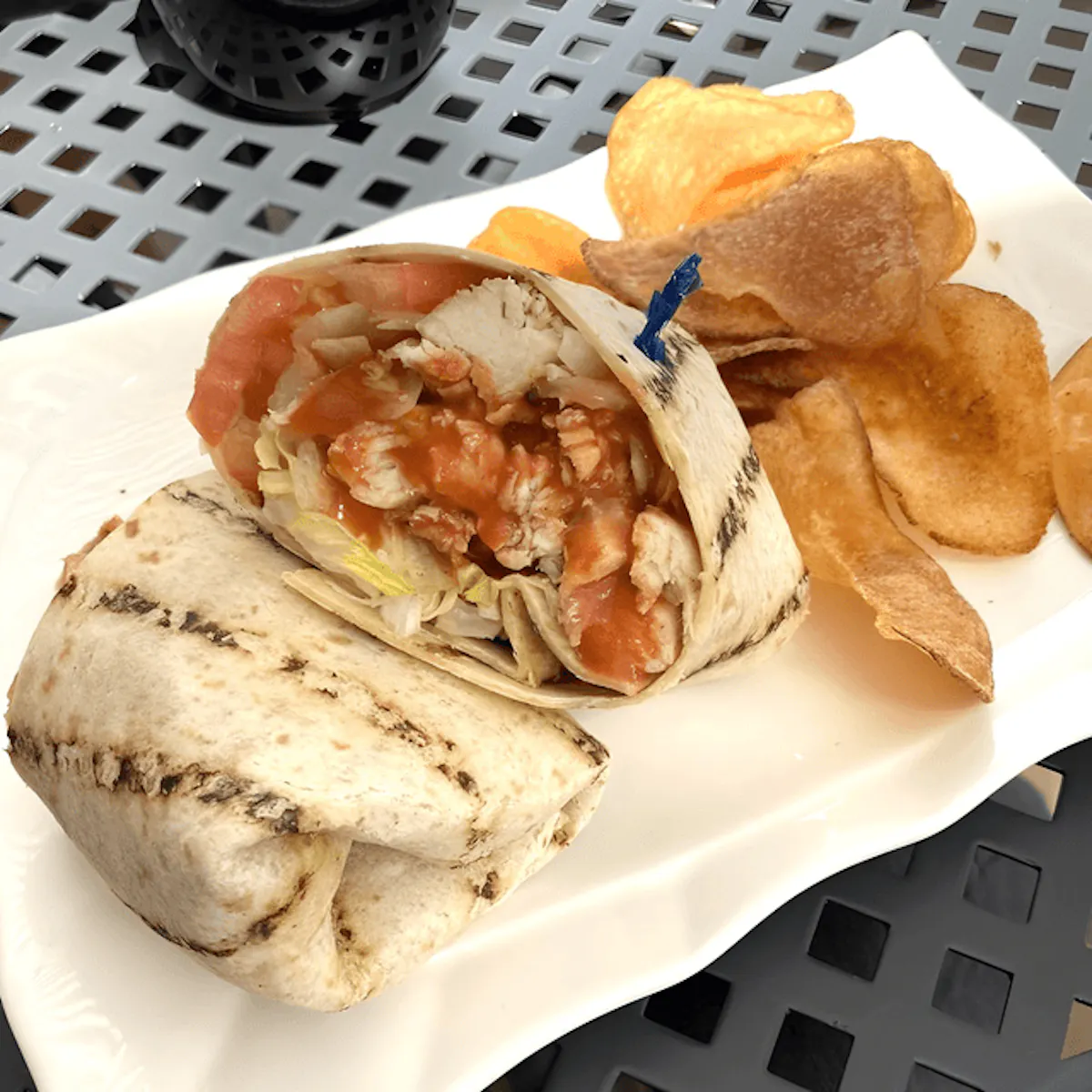 a sandwich sitting on top of a plate of food