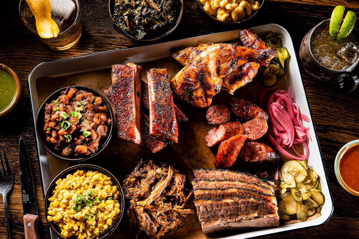 a bunch of different types of food on a table