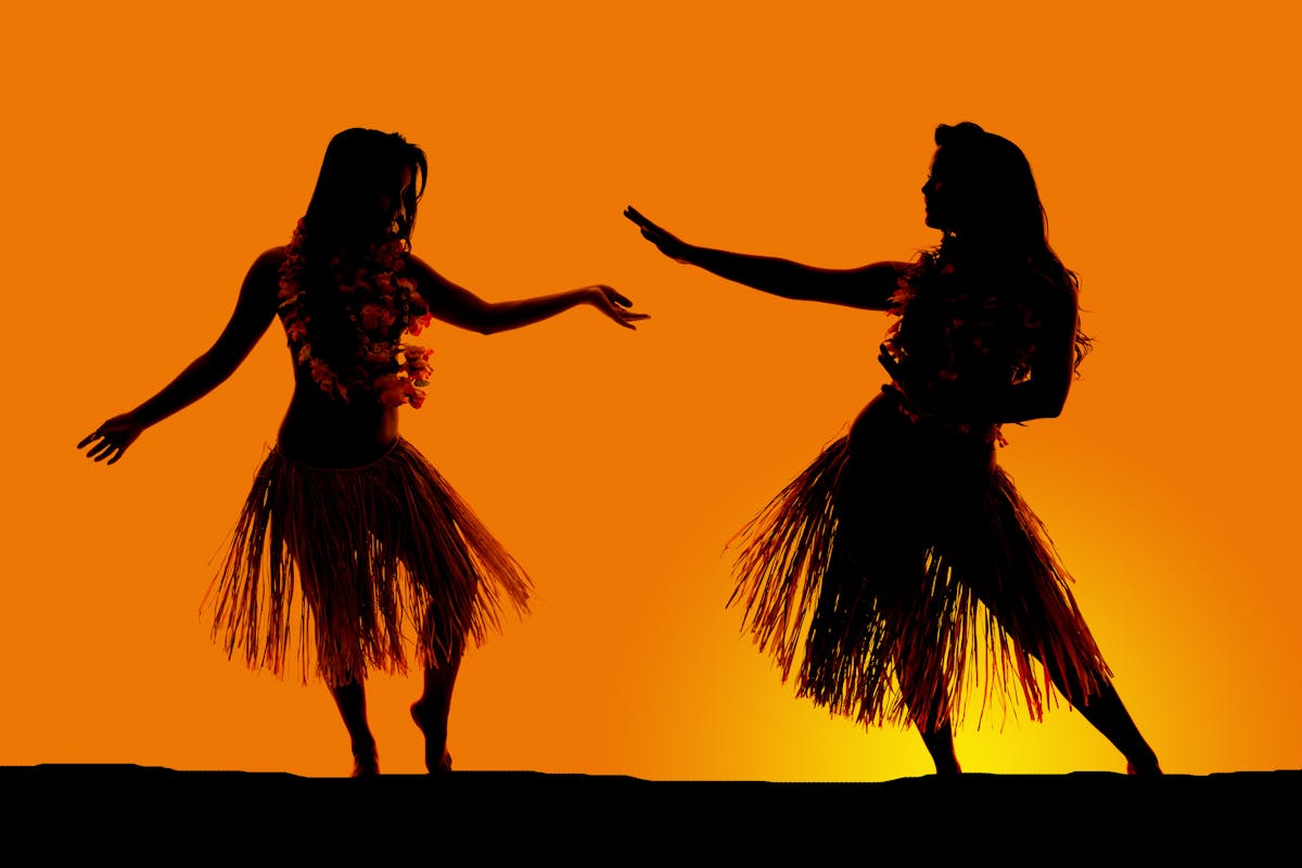 two women with with skirts dancing