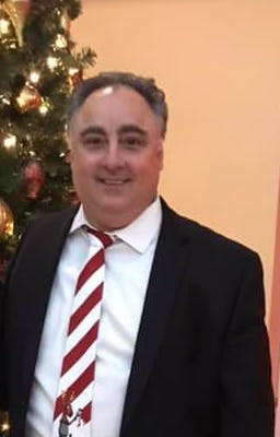 A Man Wearing a Suit and Tie