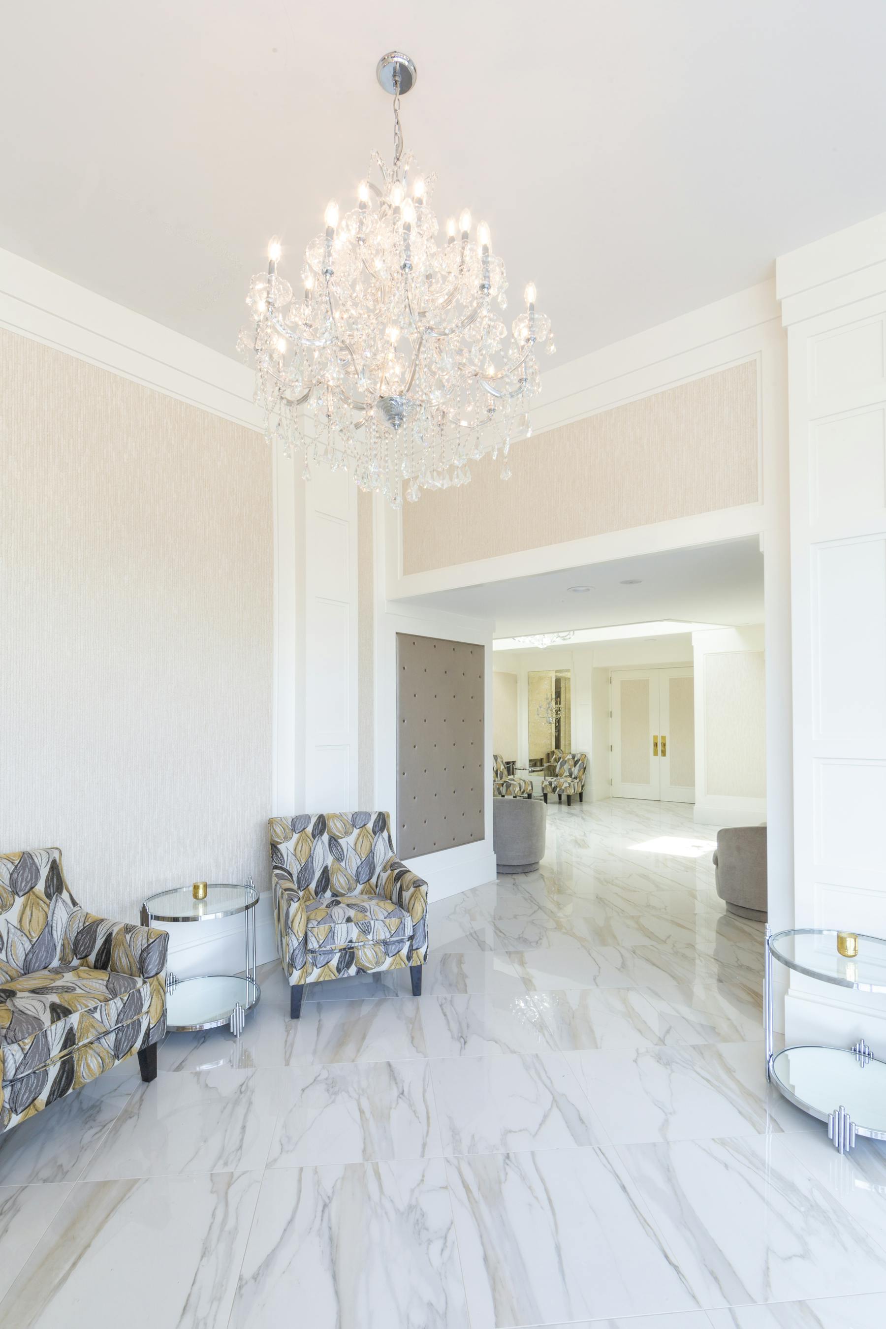 renovated entry way with 2 chairs