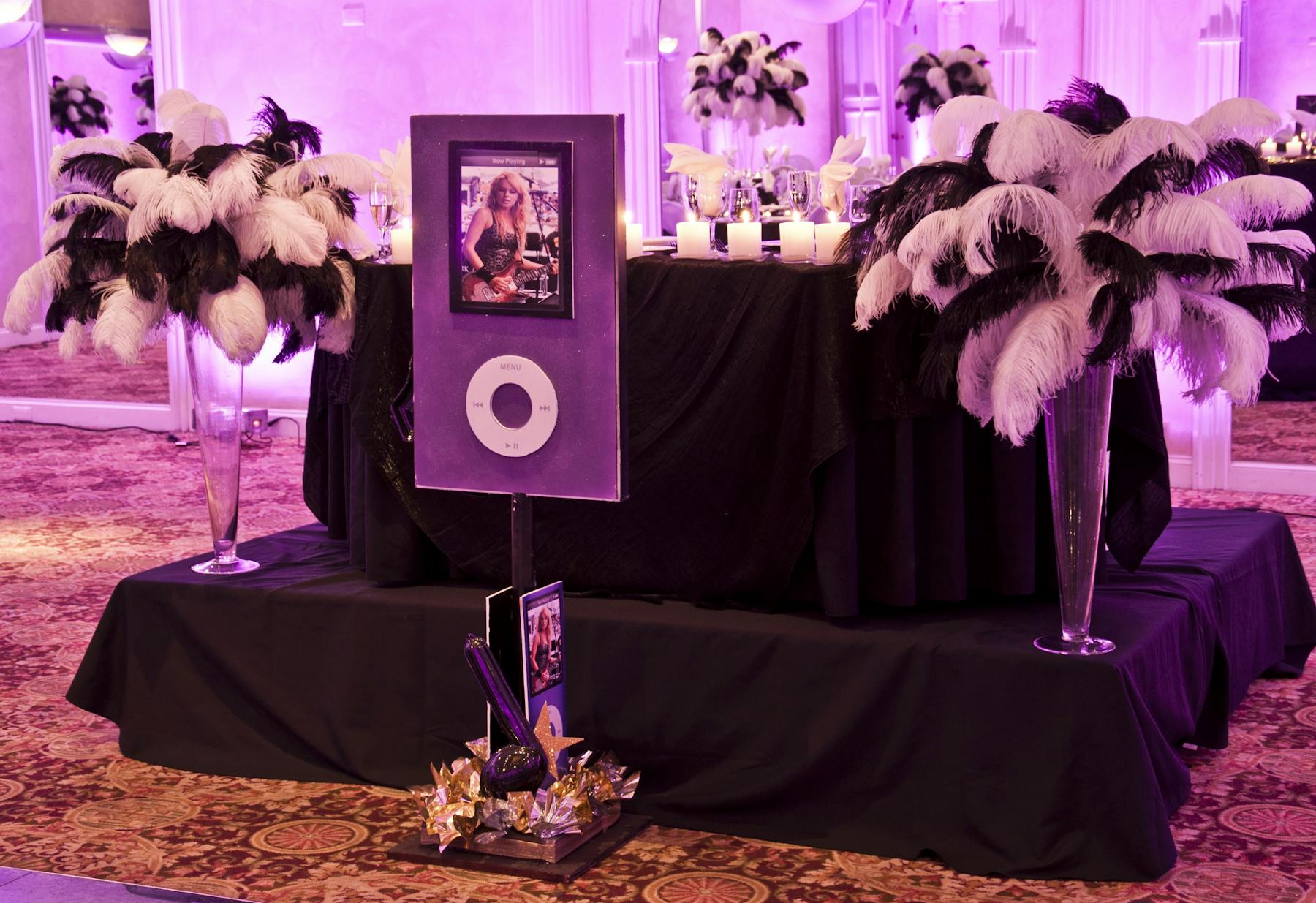 a decorated stand in front of a wall