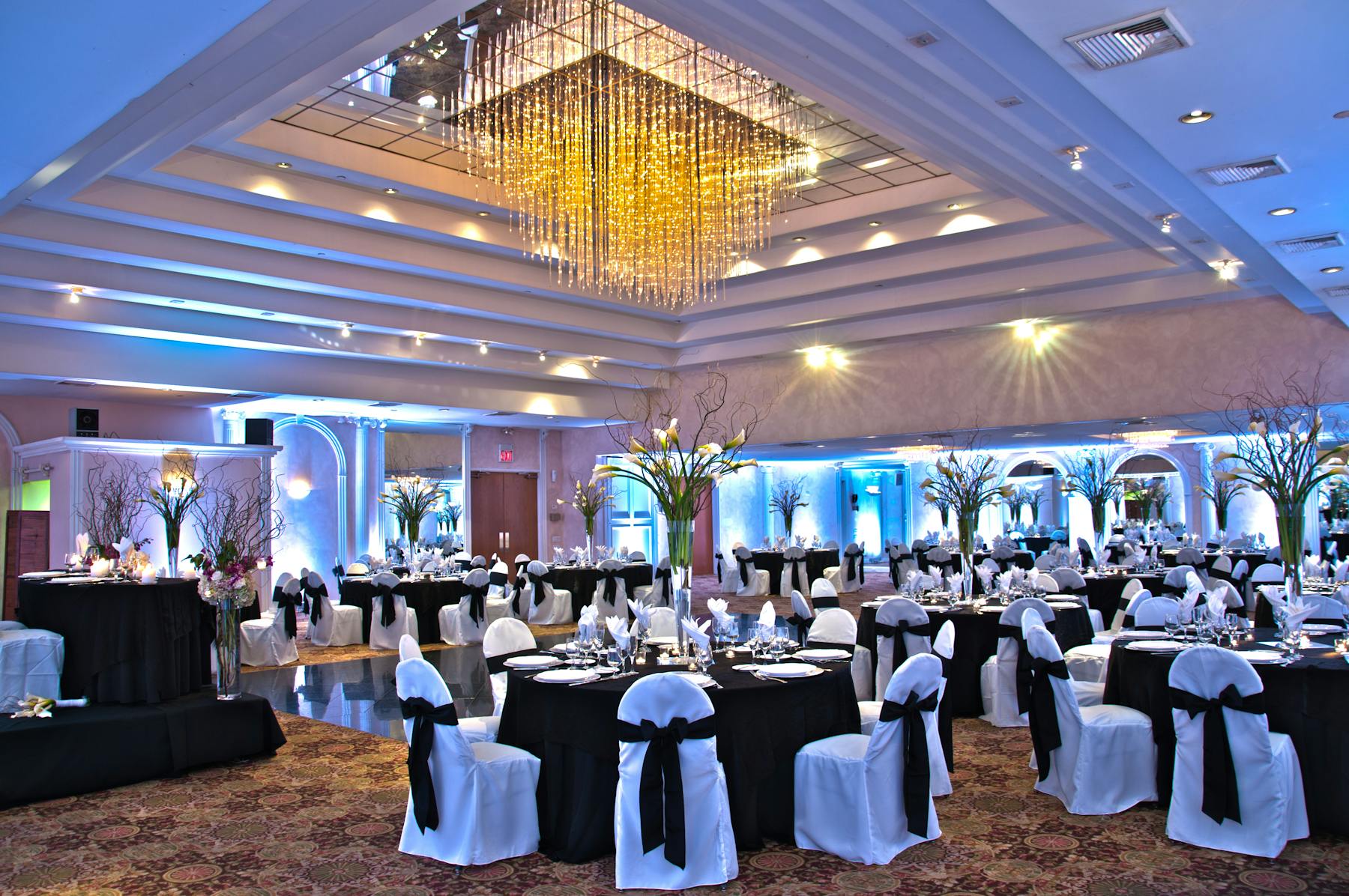 a room filled with decorated tables and chairs