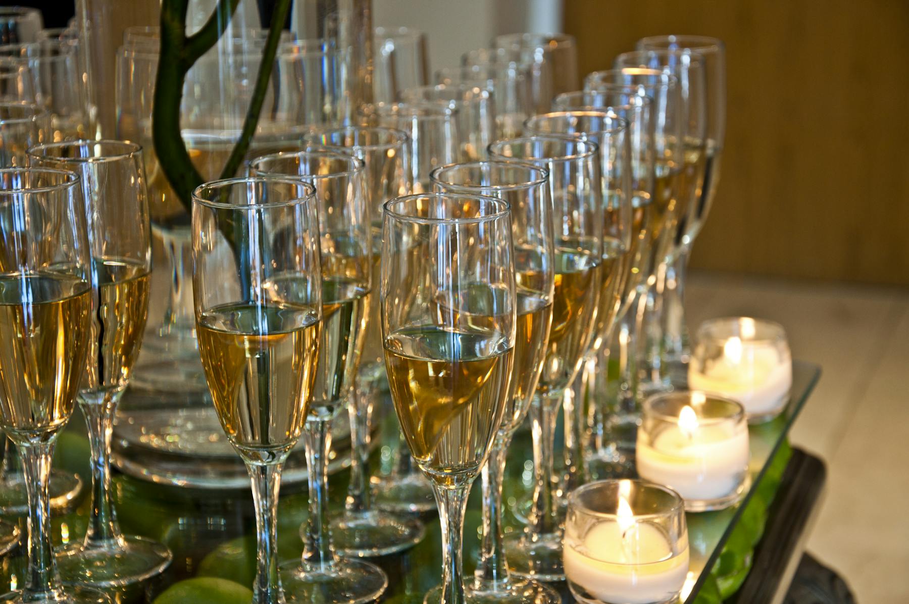 several glasses of wine on a table