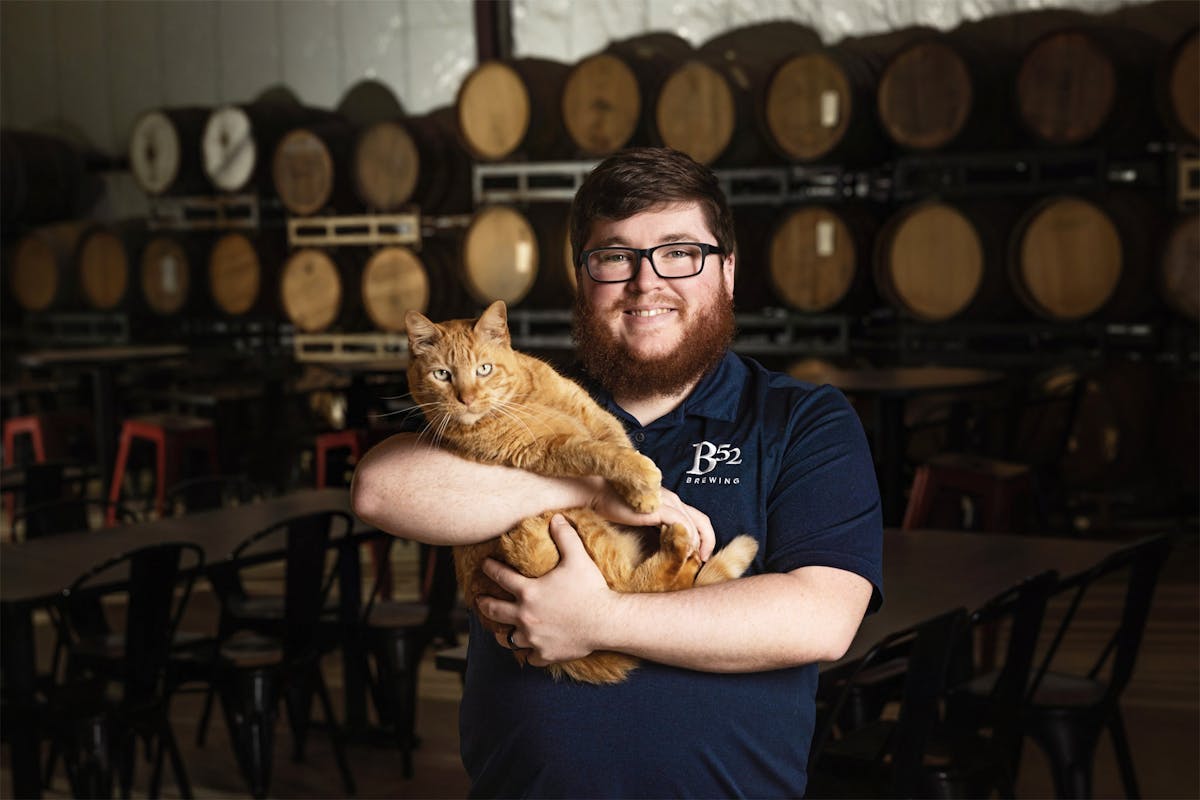 a man holding a glass of wine
