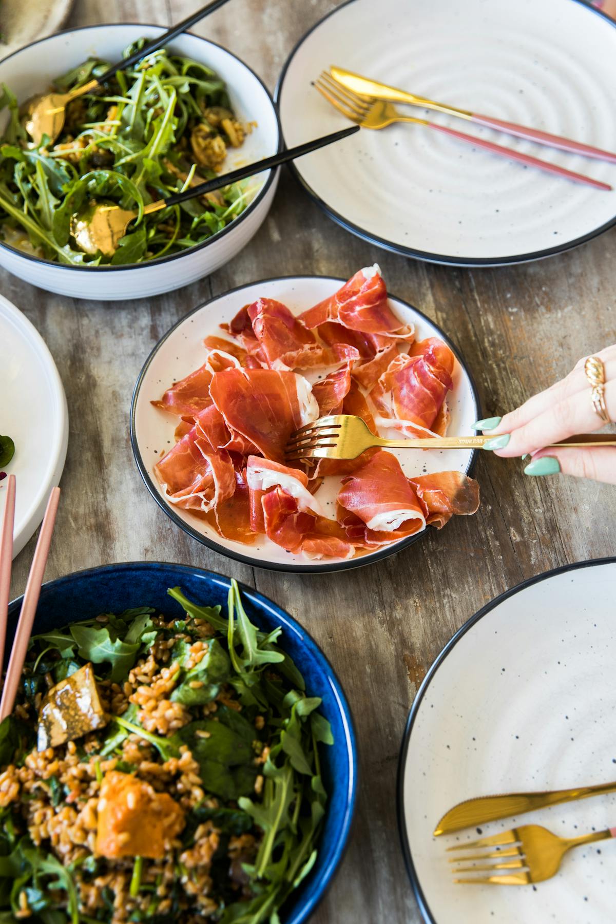 a bowl filled with different types of food on a plate