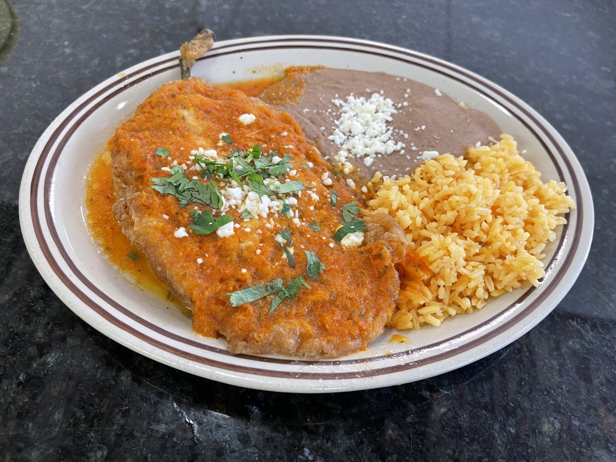 Chile relleno with rice and vegetables