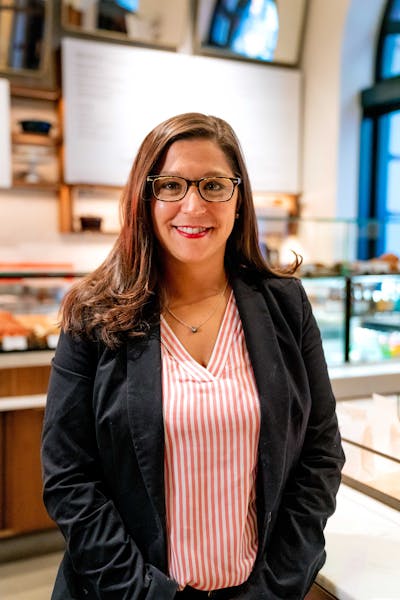 a woman wearing glasses