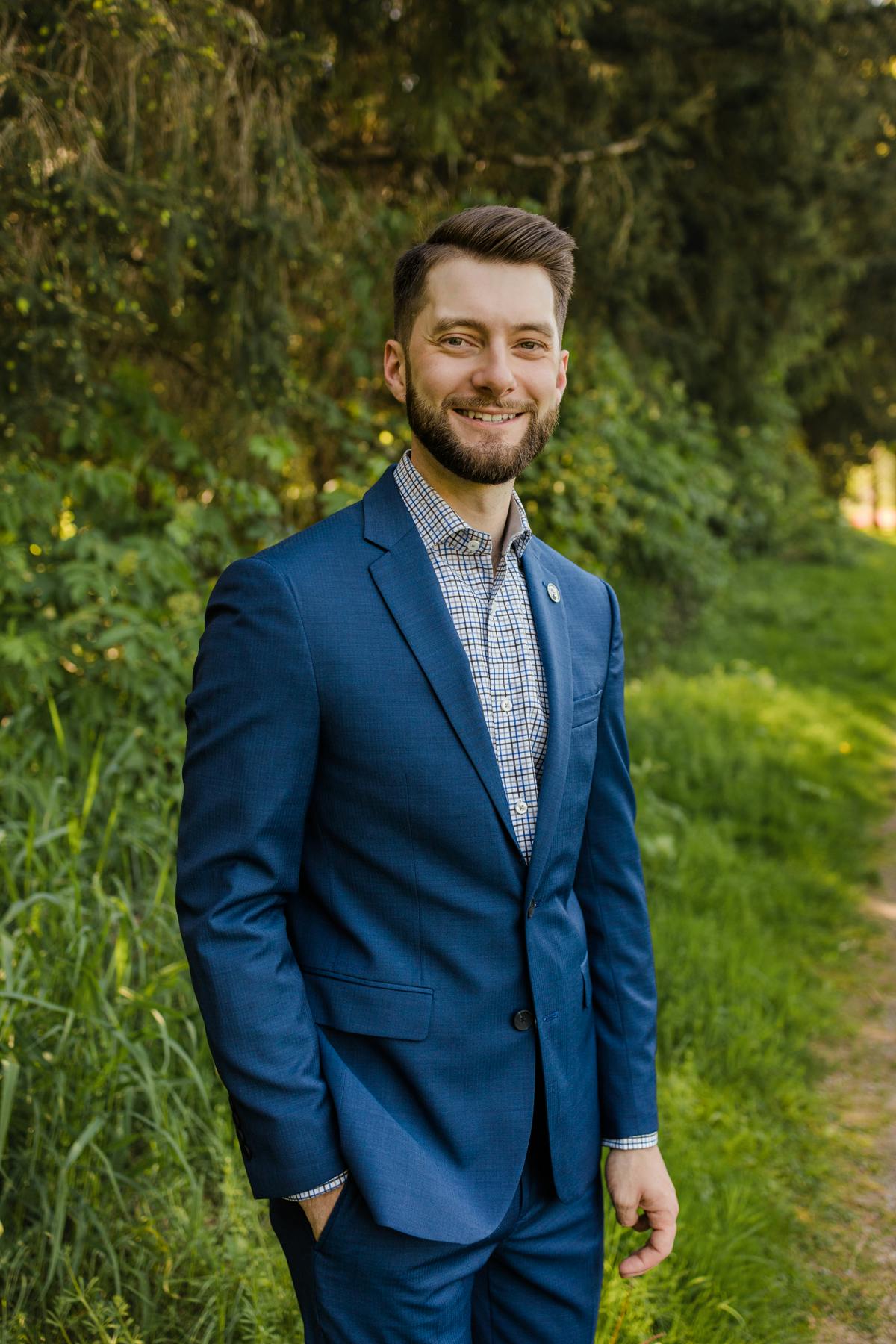 a man wearing a suit and tie