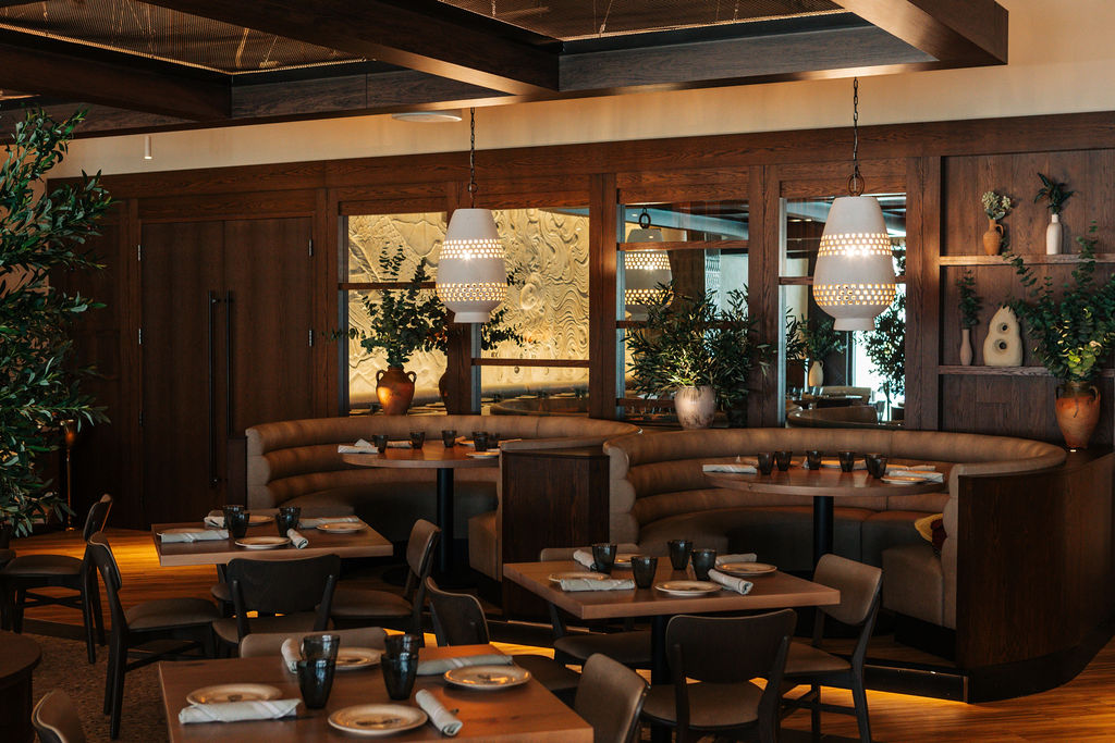 a restaurant with tables and chairs