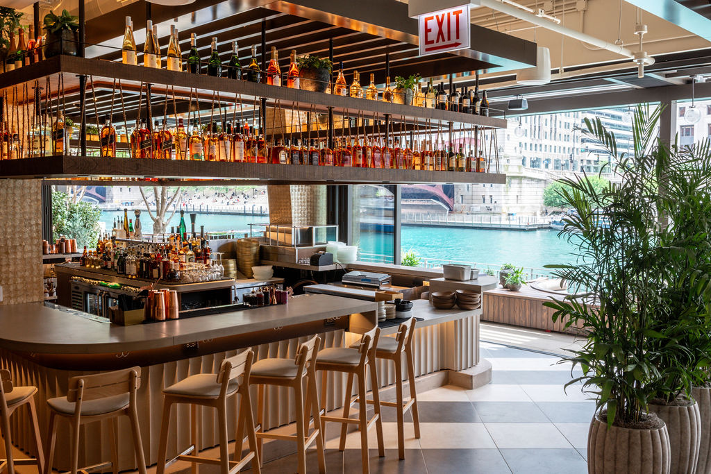 a bar with bottles of alcohol
