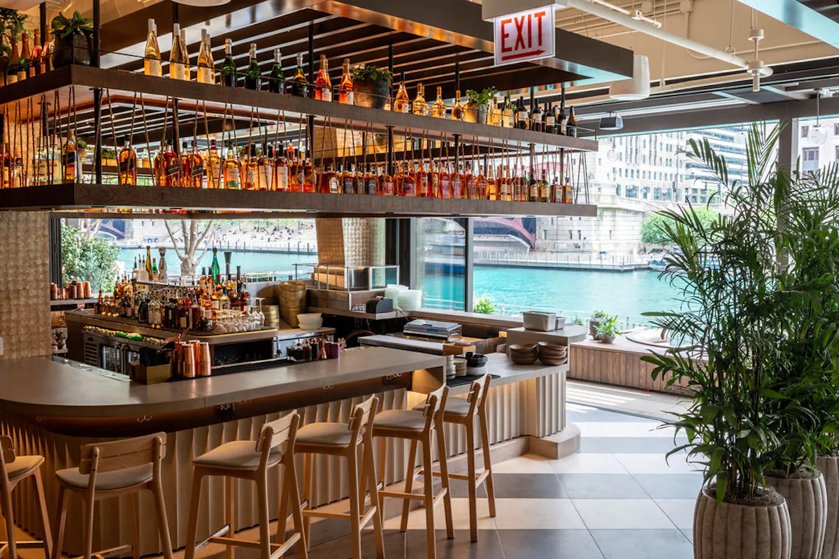 a bar with bottles of alcohol