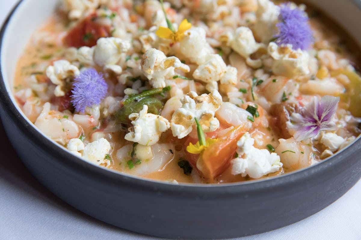 a close up of a bowl of food on a plate