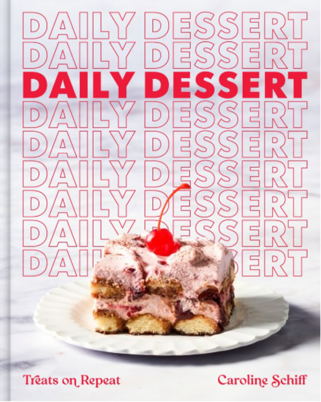 a book cover with a piece of cake on a plate