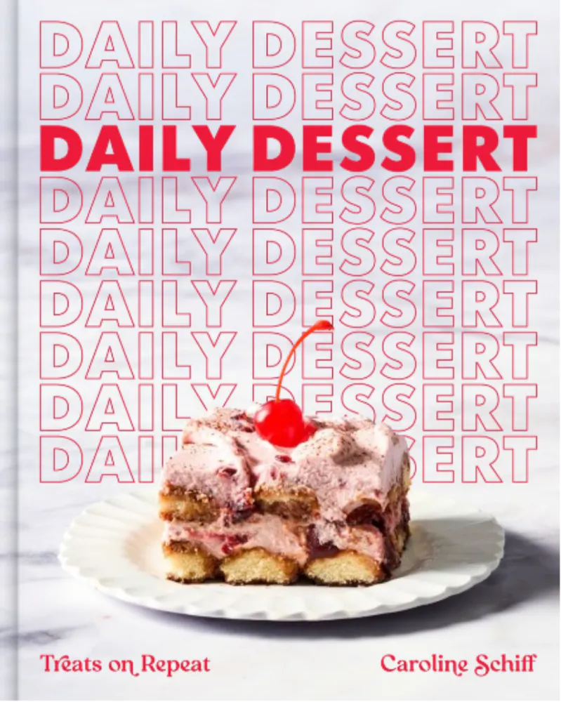a book cover with a piece of cake on a plate
