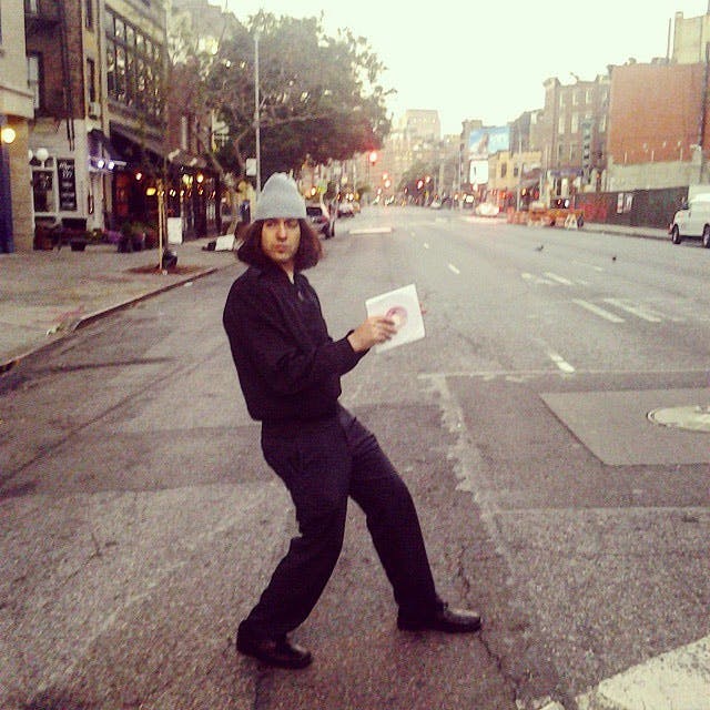 a person walking down a city street