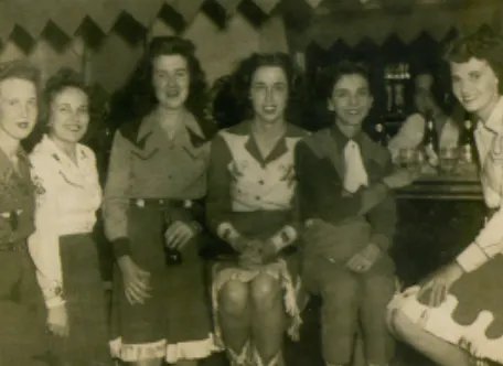 a group of people in black and white