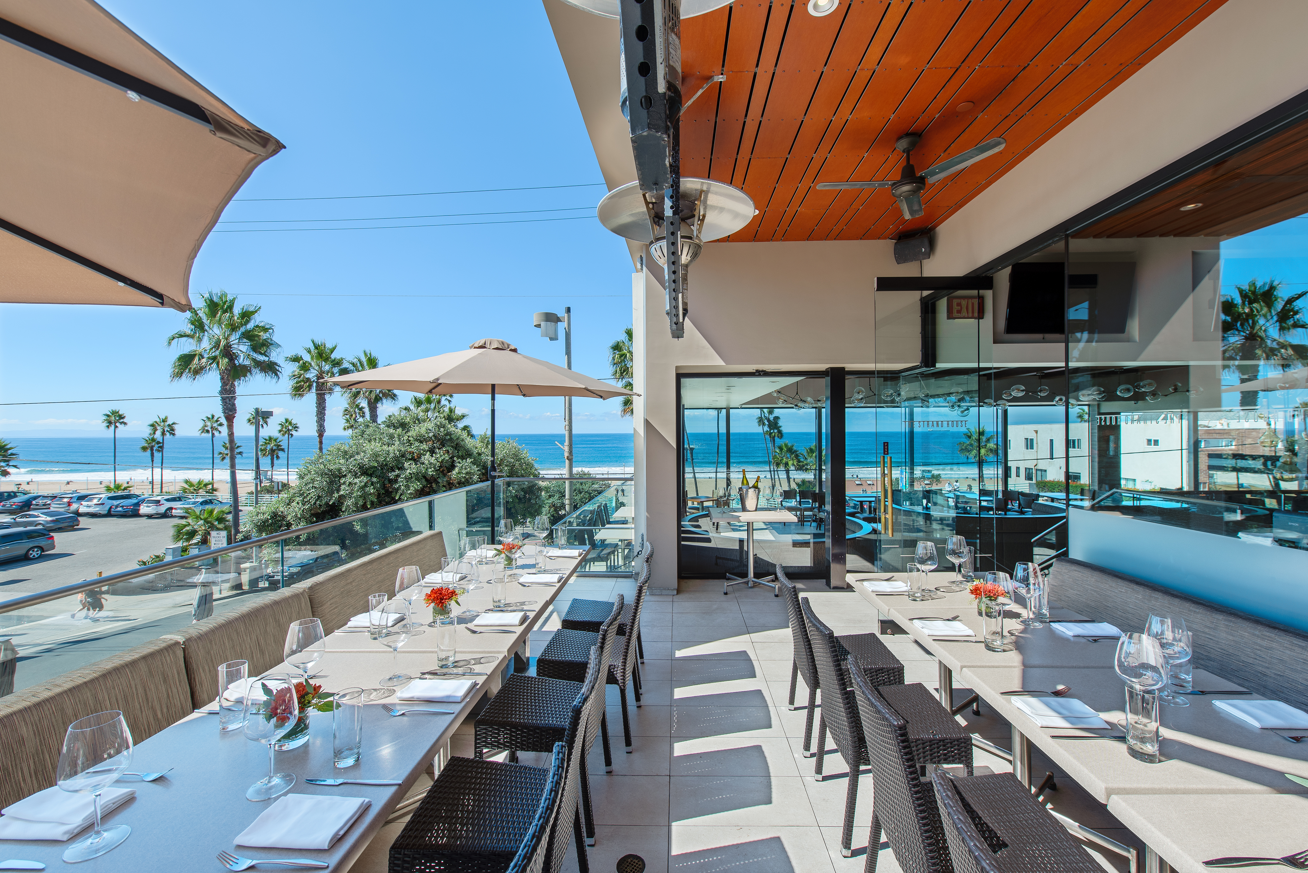a group of people sitting at a train station
