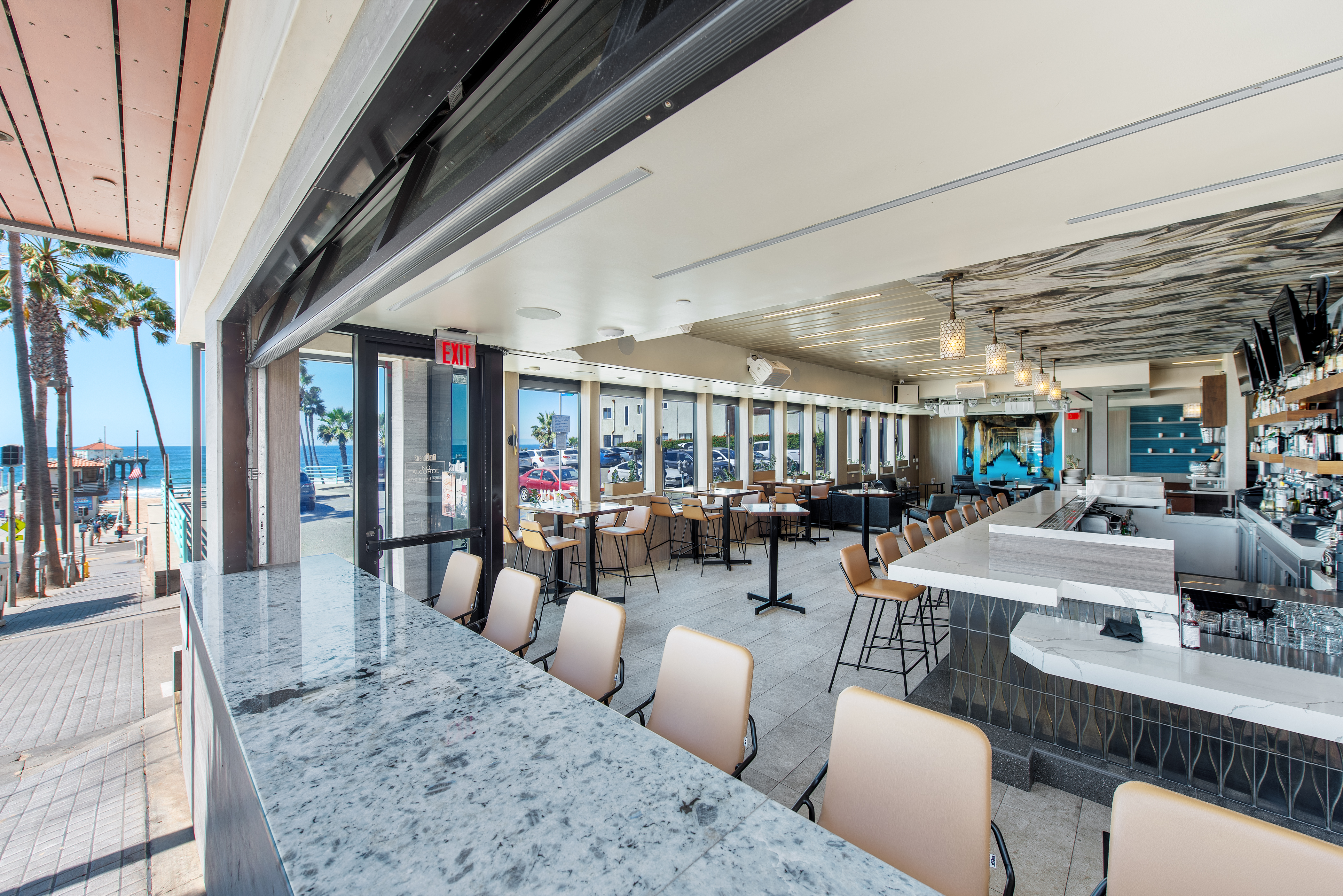 a train is parked on the side of a building