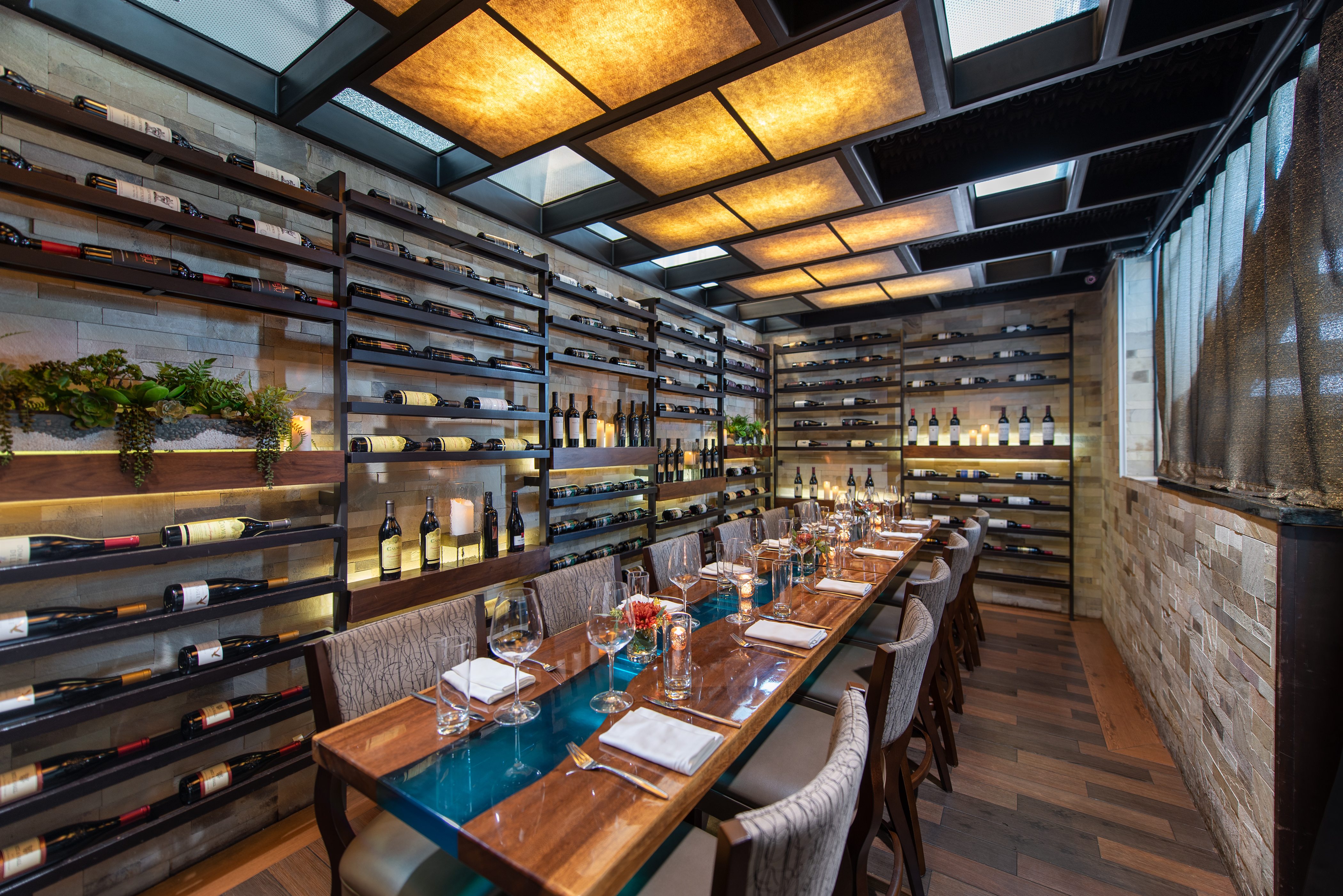 a long wooden table in a library