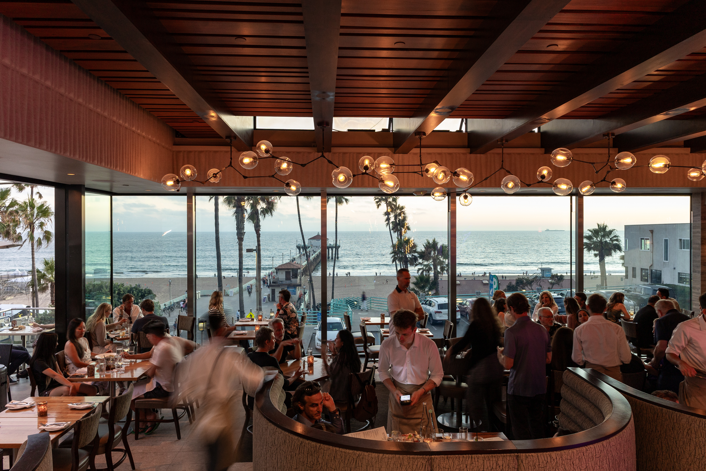 Strand House main dining room at sunset