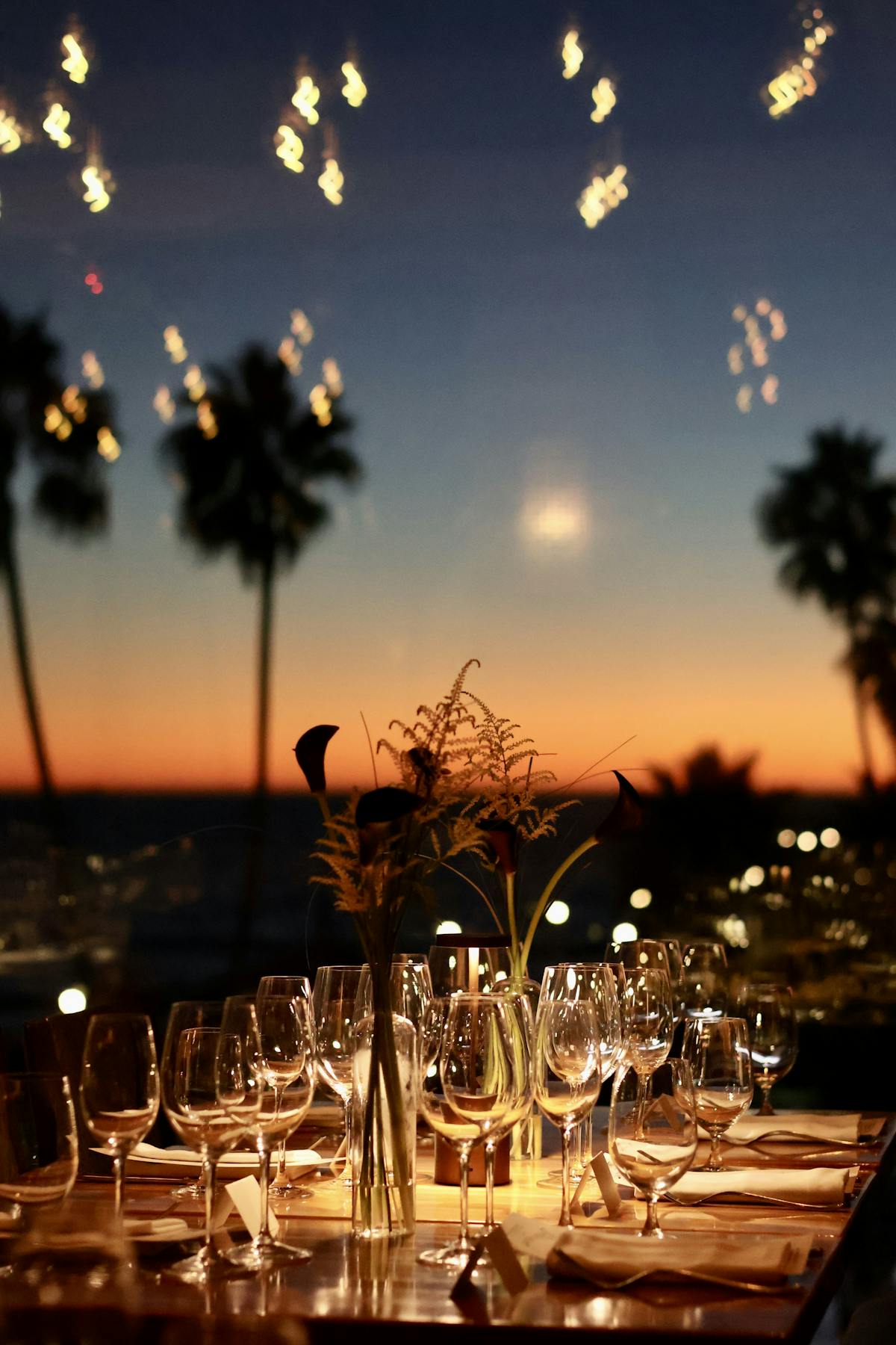 a table filled with wine glasses