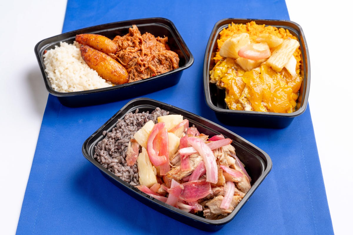 a box filled with different types of food on a tray