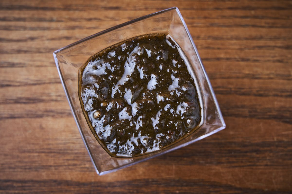 a piece of cake sitting on top of a wooden table