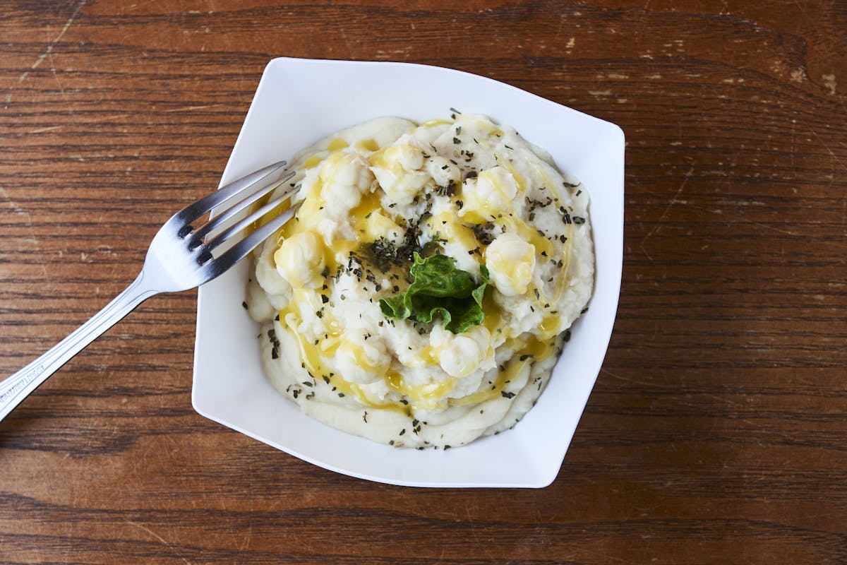 a plate of food with a fork and knife