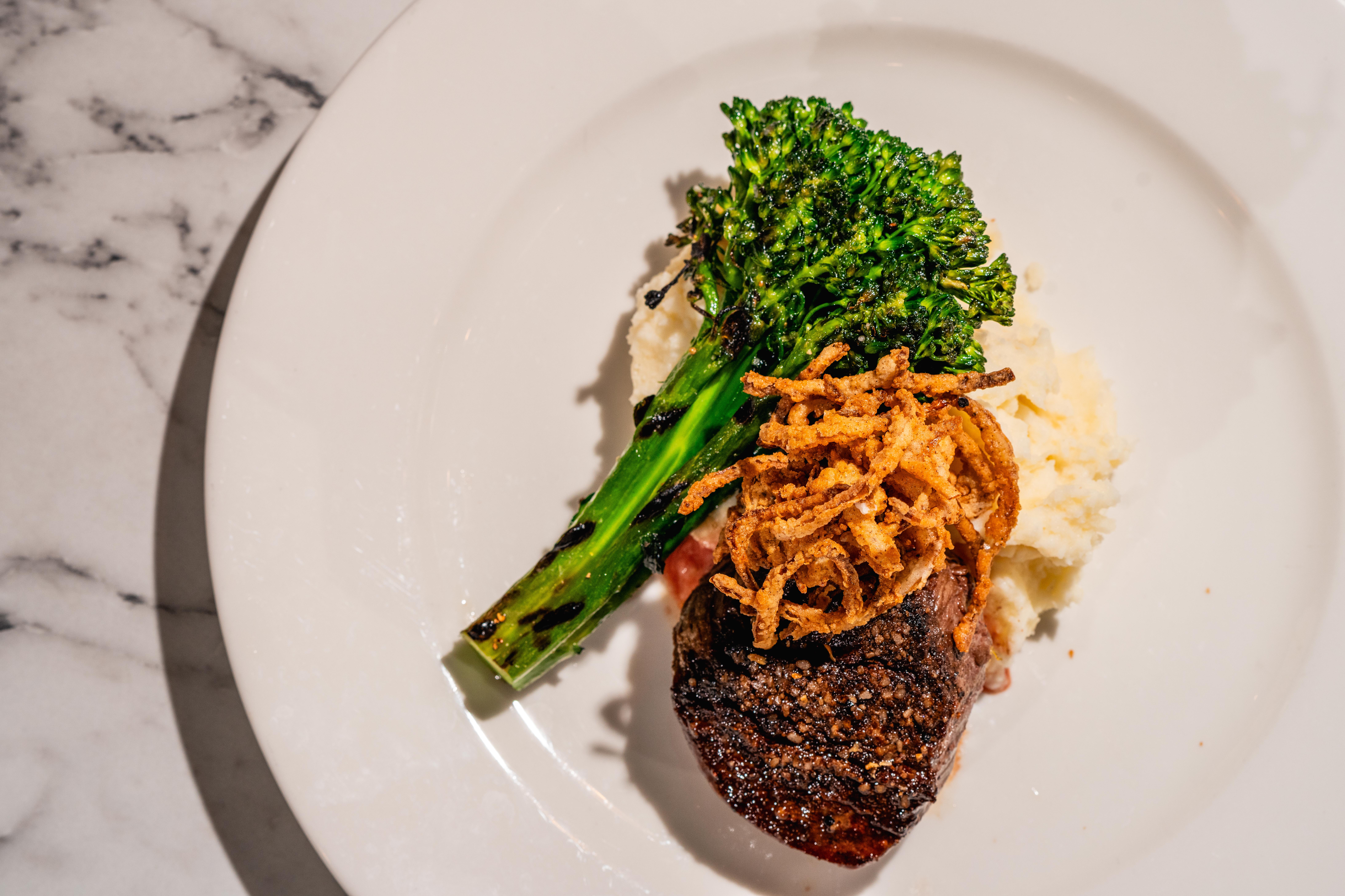 a plate of food with broccoli