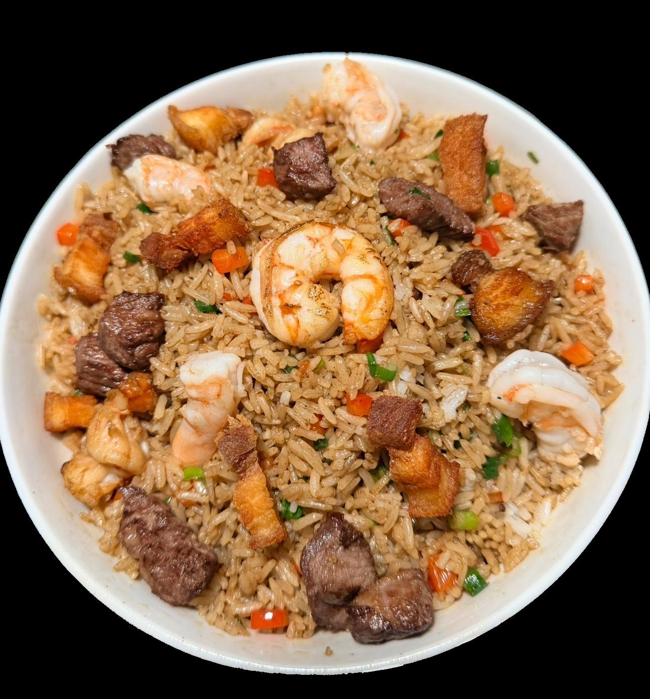 a bowl of rice with shrimp and meat