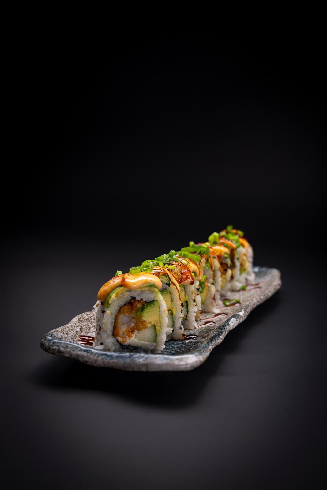 a sushi roll on a plate