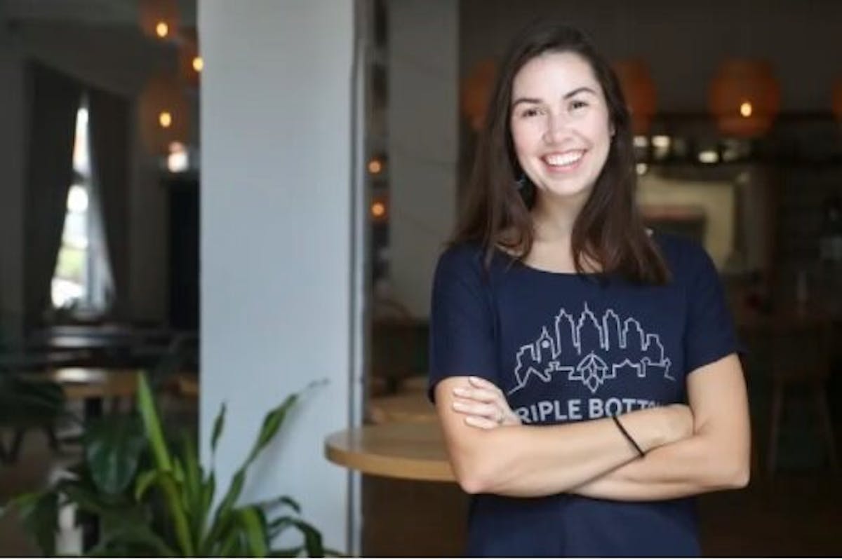 a woman smiling for the camera
