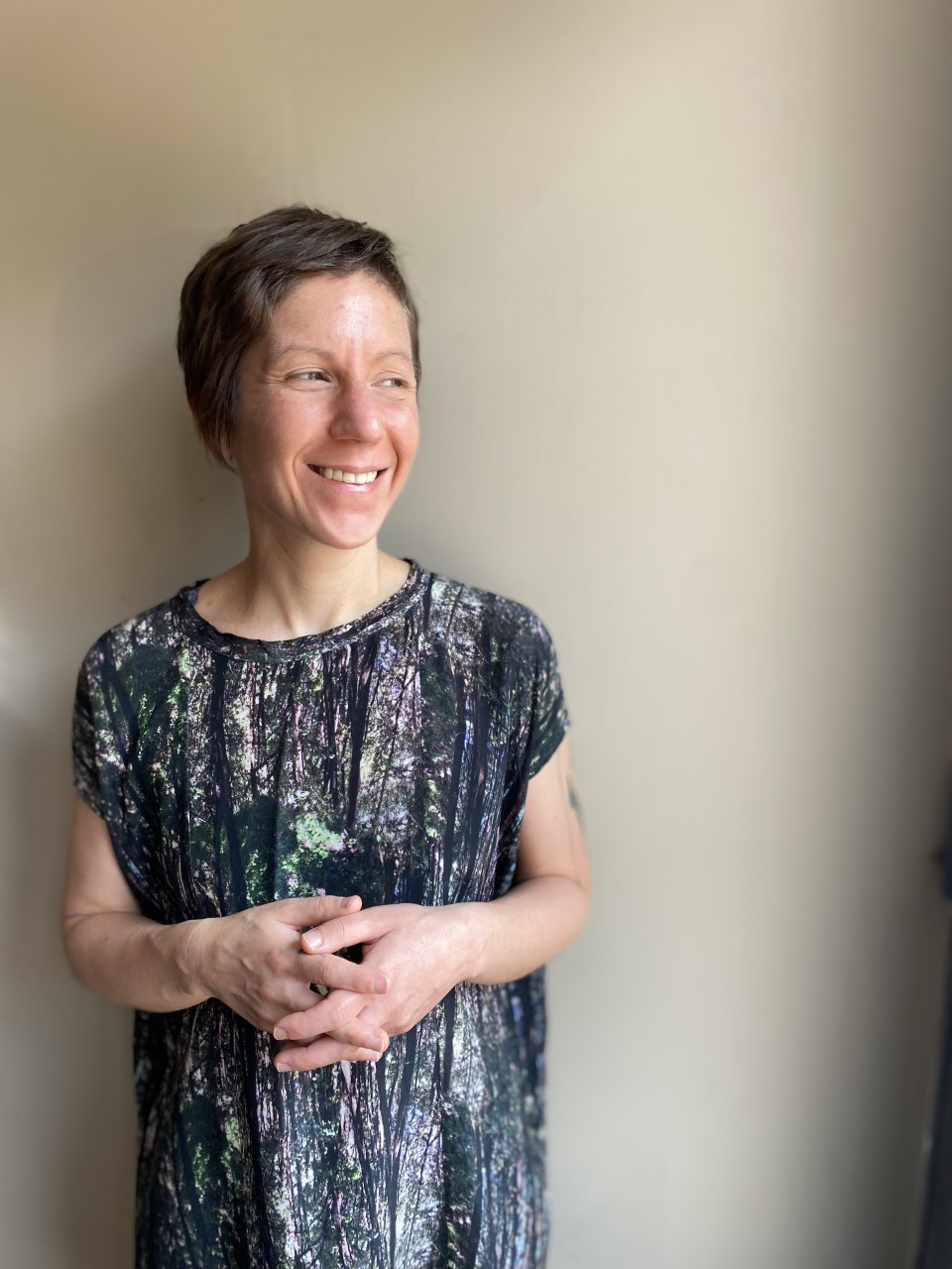 a person standing posing for the camera