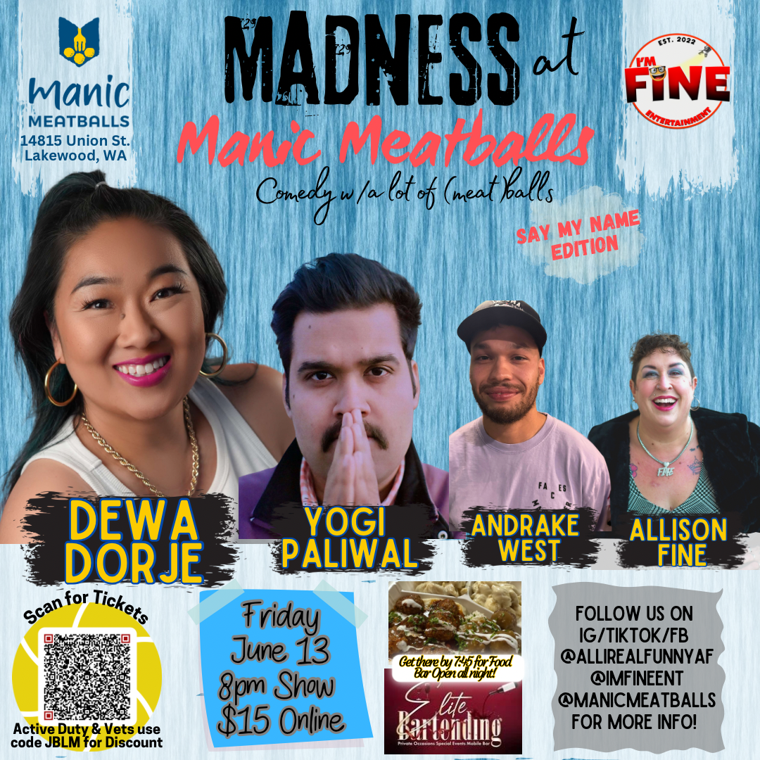 a group of people posing for a photo in front of a sign