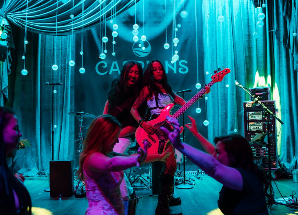 neon knights preforming at Las Vegas live music speakeasy caspians