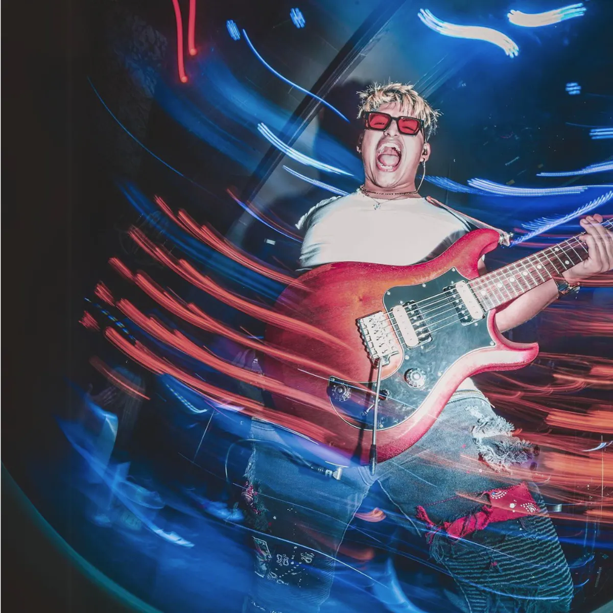 a man playing a guitar