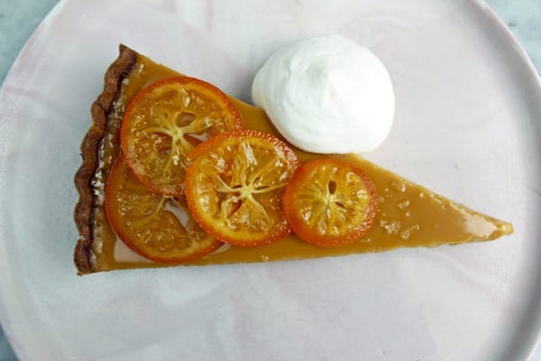 a plate of food with a slice cut out