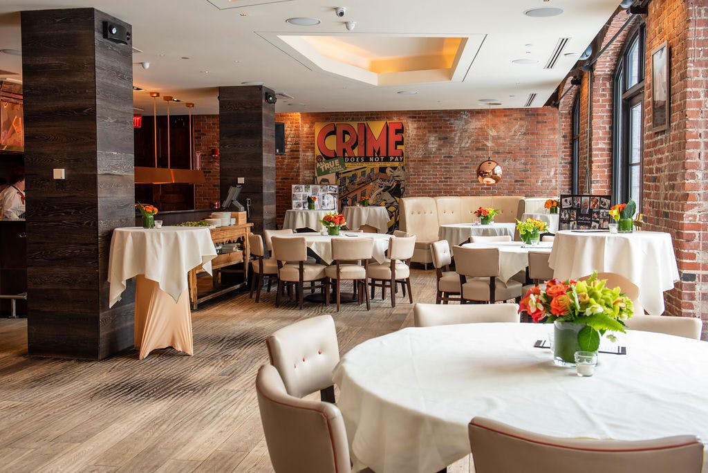 a room with a couch and table in a restaurant