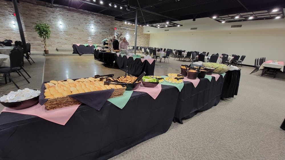 a group of people sitting at a table