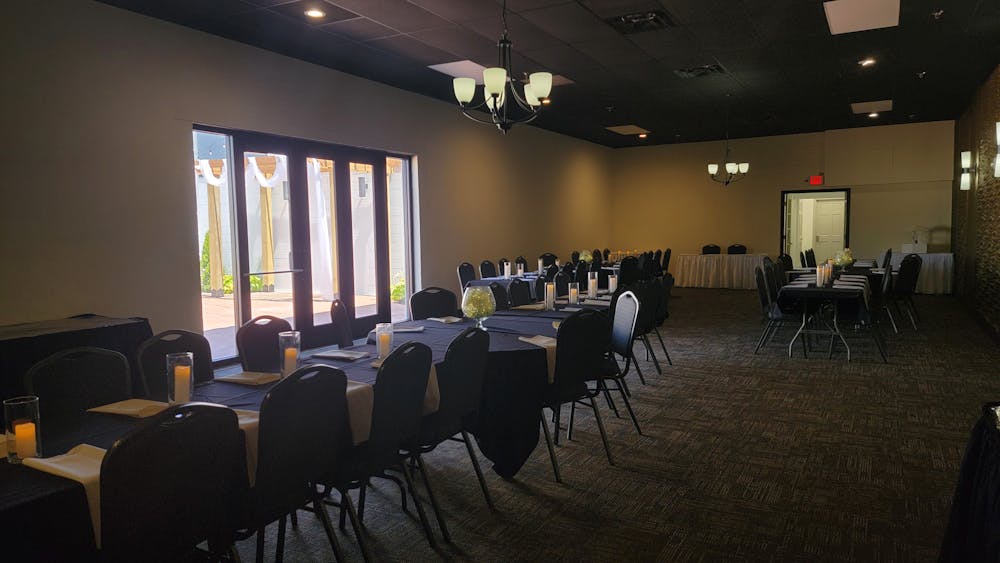 a room filled with furniture and a large window