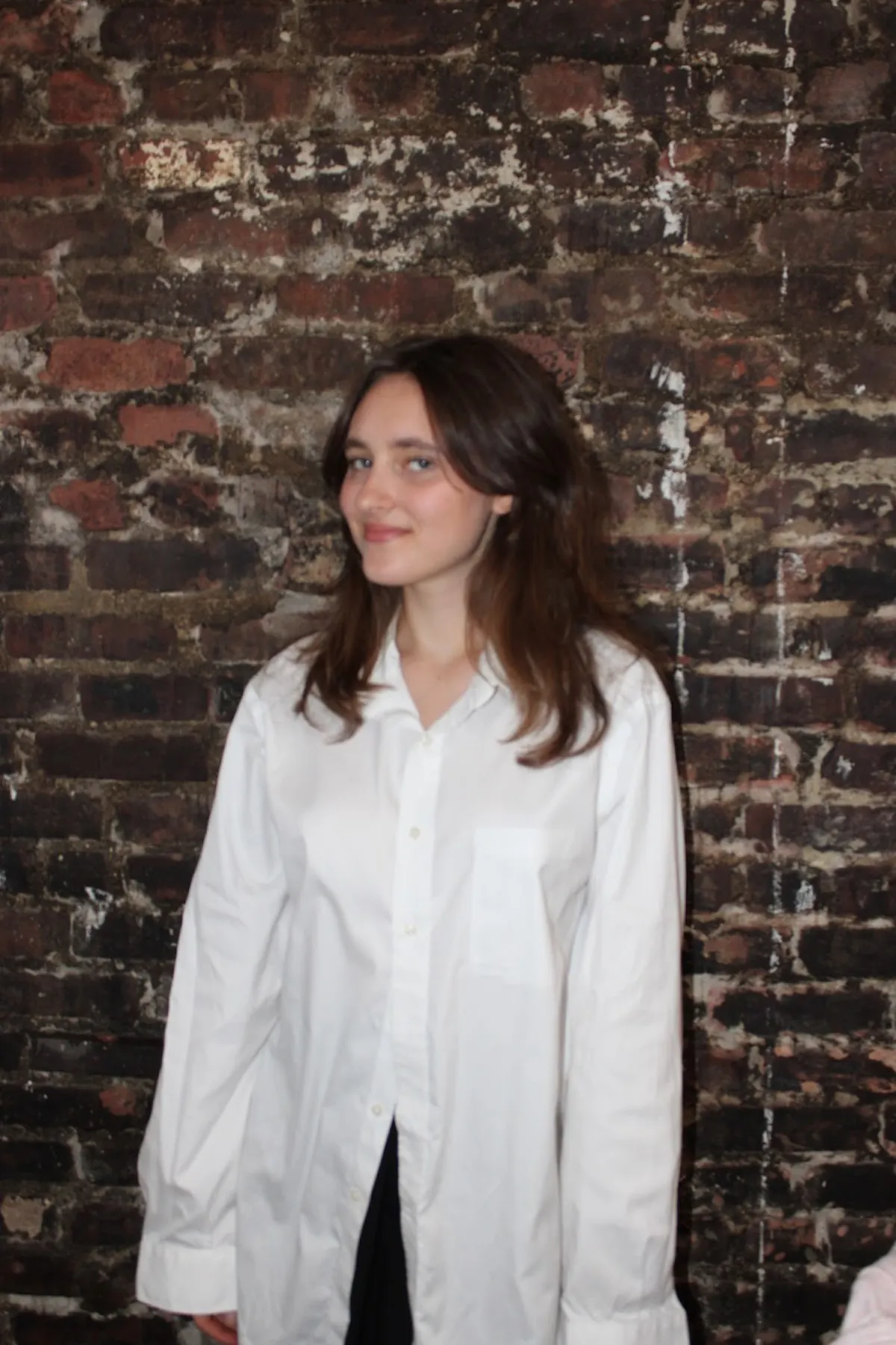 a woman in a white shirt