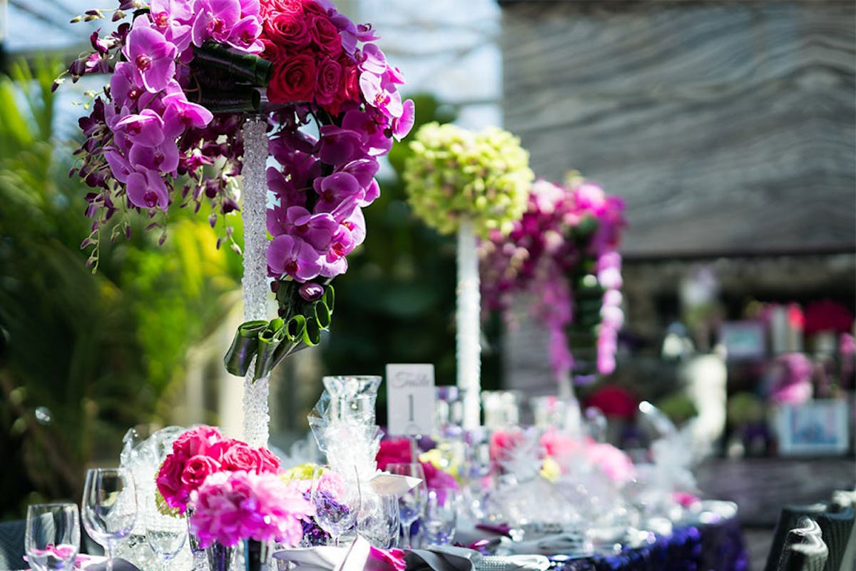 a bouquet of pink flowers on a table