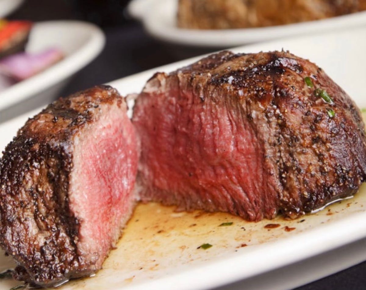 a close up of a piece of cake on a plate