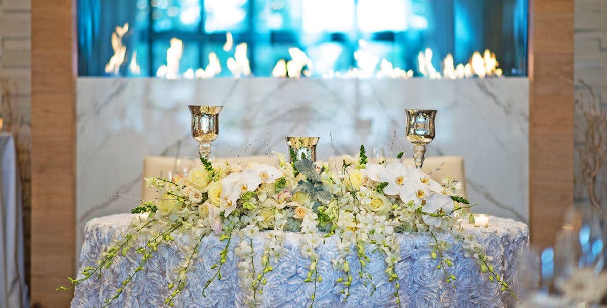 a vase of flowers on a table